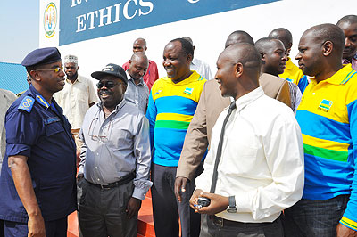 DIGP Stanley Nsabimana, shares a light moment with owners of driving schools on Monday. The New Times/Courtesy.