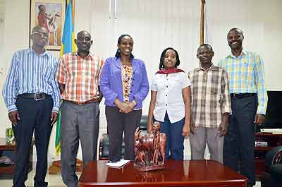 Minister Kalibata (C) in a photo with the ministry staff selected for the Vietnam training. The New Times/Courtesy.