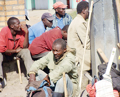 Job-seekers at the u2018Komeza Amabunou2019 spot in Musanze waiting for job opportunities. The New Times/Clement Uwiringiyimana.