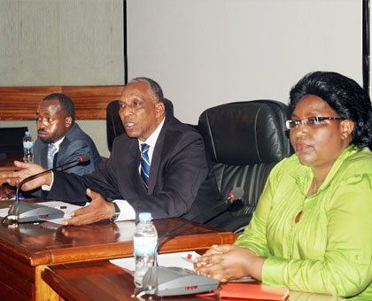 RDRC Chairman Jean Sayinzoga (C) with Coordinator Francis Musoni (L) and Commissioner Sarafina Mukantabana on Sunday. The New Times/John Mbanda.