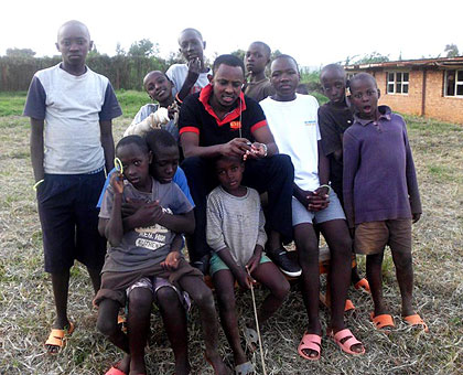 Mitali with the pupils after a photography lesson at Rwanda Orphans Project in Kanombe. The New Times / Courtesy.