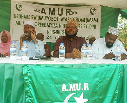 The Minister of Internal Security, Musa Fazil Harerimana (L), Mufti Abdul Karim Gahutu (C), and Jumat Nsengiyumva at the meeting on Tuesday. The New Times / Courtesy.