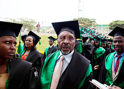 80-year old Gaethan Mudenge share the joy with with his former classmates on graduation day. The New Times/File. 