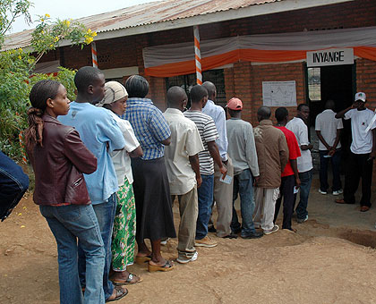 Voters queue to cast their ballots in the past. The New Times / File.