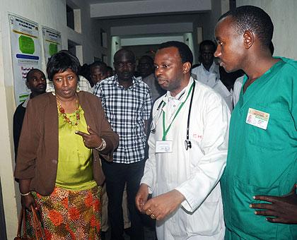 Health Minister Dr. Agnes Binagwaho (L) with Medical staff at Muhima  on a tour of the Hospital yesterday. Sunday Times / John Mbanda.