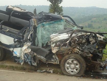 The wreckage of the police Toyota pick-up that was smashed by a speeding truck. The New Times / Courtesy.