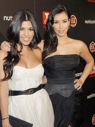 Kourtney and Kim Kardashian. Net photo