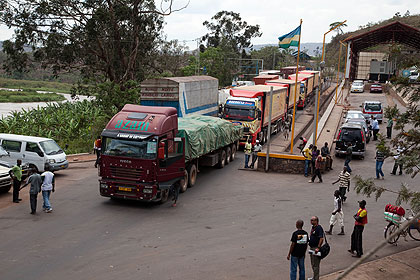 Trucks cross the Rwanda-Tanzania border of Rusumo. The New Times / File.  