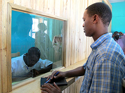 A customer being served in a local sacco: The sector has realised fast growth in recent years. The New Times / File.