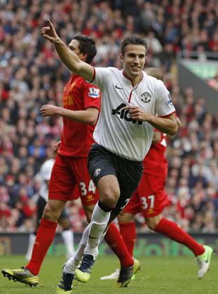 Robin Van Persie wheels away in celebration after scoring against Liverpool in the first round at Anfield. Net photo