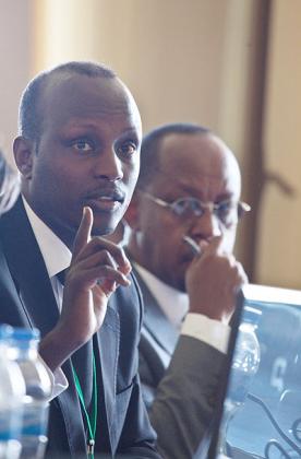 Sagashya (L) together with John Gara, the president of  the National Legal Reform Commission during yesterdayu2019s meeting. The New Times  / Timothy Kisambira