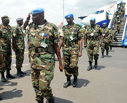 Major Emmanuel Rugangazi leads the RDF 63 battalion that returned from Darfur yesterday. The New Times/ John Mbanda.