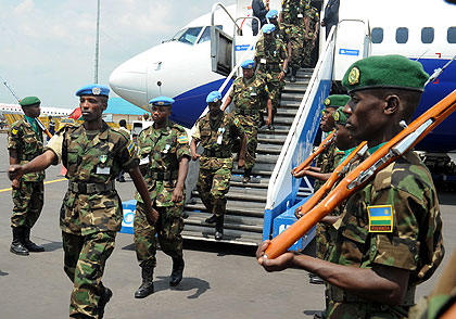 The RDF troops that built nine schools return from  a peace keeping mission in Darfur. The New Times/ John Mbanda