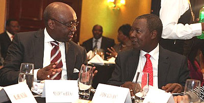 The president of African Development Bank Donald Kaberuka (left) confers with Central Bank of Kenya governor Njuguna Ndungu2019u during the Kenya Bankers Association luncheon held in Nairobi last Tuesday.  Net photo.