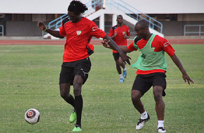 Togolese national team captain Emmanuel Adebayor (left) with his team mates during a training session. Togo know they need to beat Algeria to have any chance of progressing. Net photo.