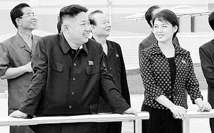 North Korean leader Kim Jong-un and his wife, Ri Sol-ju, in this undated photo released on July 25, 2012. The young president has threatened to retaliate against UN sanctions. Net Photo