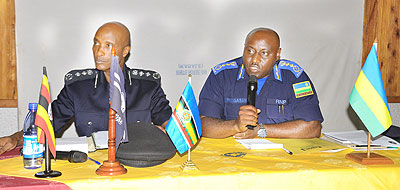 Gasana (R) speaks at the meeting yesterday as Gen. Kayihura looks on. The New Times/  Courtesy