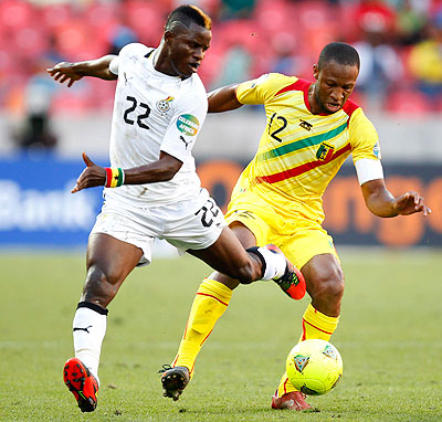 Seydou Keita-led Mali (right) to finish behind Ghana in Group B having lost to the leaders. Net photo.