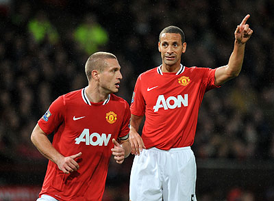 United captain Nemanja Vidic (left) has urged his teammates to put more points on board. Net photo.