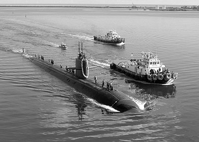 The attack submarine USS San Francisco (SSN 711) is escorted by two harbour tugs in this file                  picture. The drills will involve a US nuclear submarine - Wikimedia Commons. Net photo.