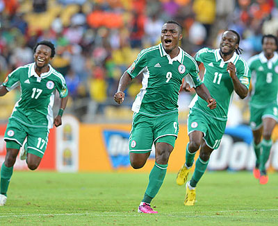 Emmanuel Emenike (9) celebrates after scoring Nigeriau2019s opening goal.  Net photo.