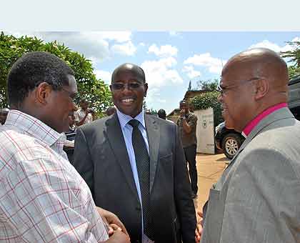 The Minister of Local Government, James Musoni (C), with the Kenyan delegation at his office in Kigali yesterday. Right is Rev. Andrew Karamaga, the General Secretary of All Africa Conference of Churches, whou2019s leading the visiting team. The New Times/Courtesy .