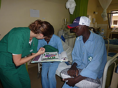 A doctor attends to a patient at King Faisal Hospital in Kigali. The hospital is one of the centres where facial surgeries are currently being conducted. The New Times/File.