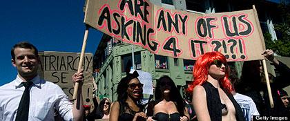 More than a thousand people march through the city, taking part in the first Slut Walk on August 20, 2011, in Cape Town.