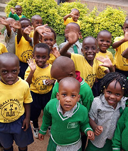 While still young, these Kigali Harvest School pupils will grow up and begin exploring relationships. Photo David Winston Hansen.