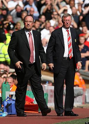 Sir Alex Ferguson (right) and Rafael Benitez (left) are best of enemies. Net photo.