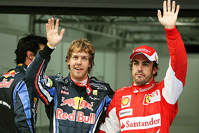 Sebastian Vettel  (left) and Fernando Alonso (in the background) will be favourites once against this season. Net photo.