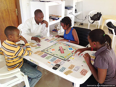  Children with their teacher at Kigali Professional Tutors. Education Times/Courtesy 