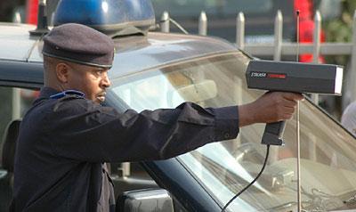 A police officer with a speed gun. Sunday Times/File.