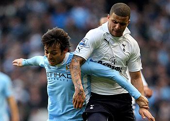 Manchester City midfielder David Silva battles with defender Kyle Walker of Tottenham in the corresponding fixture at Etihad Stadium. Net photo.