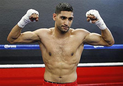 British boxer Amir Khan poses during a media opportunity. Net photo.