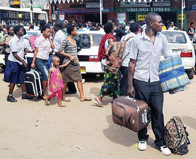 Students at Nyabugogo Bus terminal returning to their respective schools after first term holidays on Monday. The New Times, John Mbanda.