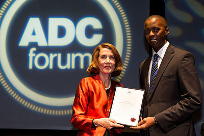 Ndizeye (R) receives his award from Elizabeth Alexander, the chancellor of the University of Melbourne. Courtesy photo.