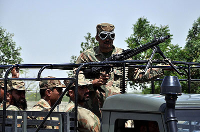 Pakistani army officials have left for Sindh province on Friday to protect polling stations ahead of the election.  Net photo.