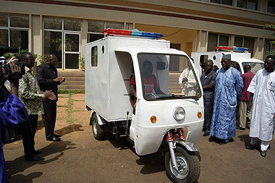 People look at one of the Motorcycle ambulances. Net photo.