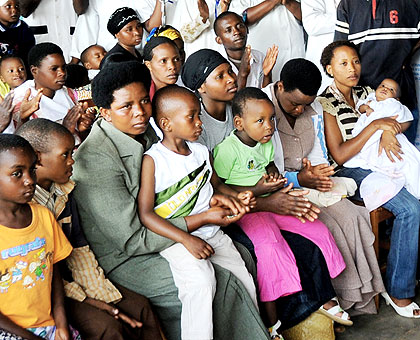 Mothers and their children await healthcare at Kicukiro Health Centre. Health posts will boost service delivery. The New Times/  T. Kisambira.