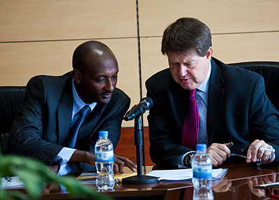 RAAu2019s Tusabe (L) and TMEAu2019s Matsaert during the signing ceremony. The New Times/T. Kisambira