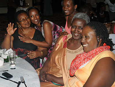 Mothers and their daughters enjoy happy moments during a dinner on Mothersu2019 Day on Sunday The New Times / John Mbanda. 