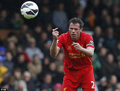 Liverpool defender Jamie Carragher is retiring at the end of the season. Net photo.