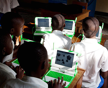 Pupils of Kimisagara Primary School use their laptops. The New Times/ Timothy Kisambira.