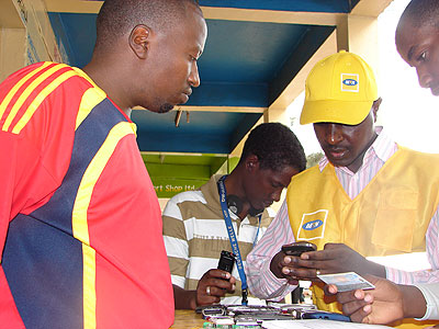 Telecom personnel register subscribers in Kigali. The New Times/ File.