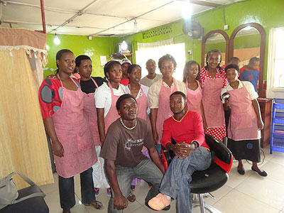 The lawyer cum business woman (second, right) poses for a photo with some of her workers. The New Times / Peterson Tumwebaze