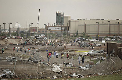 Property was strewn amongst the wreckage of flattened homes. Net photo.