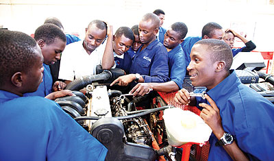 Students training to become mechanics.  The New Times/ Timothy Kisambira