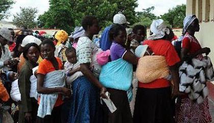 Zimbabwean mothers waiting to cast their vote in Epwath on March 16, 2013 for constitutional referendum. President Robert Mugabe Wednesday signed into law the constitution, paving the way for fresh elections. Net photo.