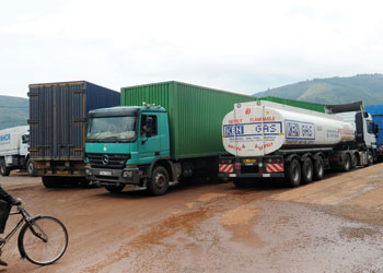 Fuel and cargo trailers wait for clearance at Gatuna border. When the One-stop border post is made into law, it will remove delays and bureaucracies at border posts. The New Times/ File